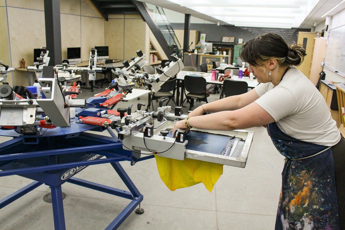 student printing a t-shirt